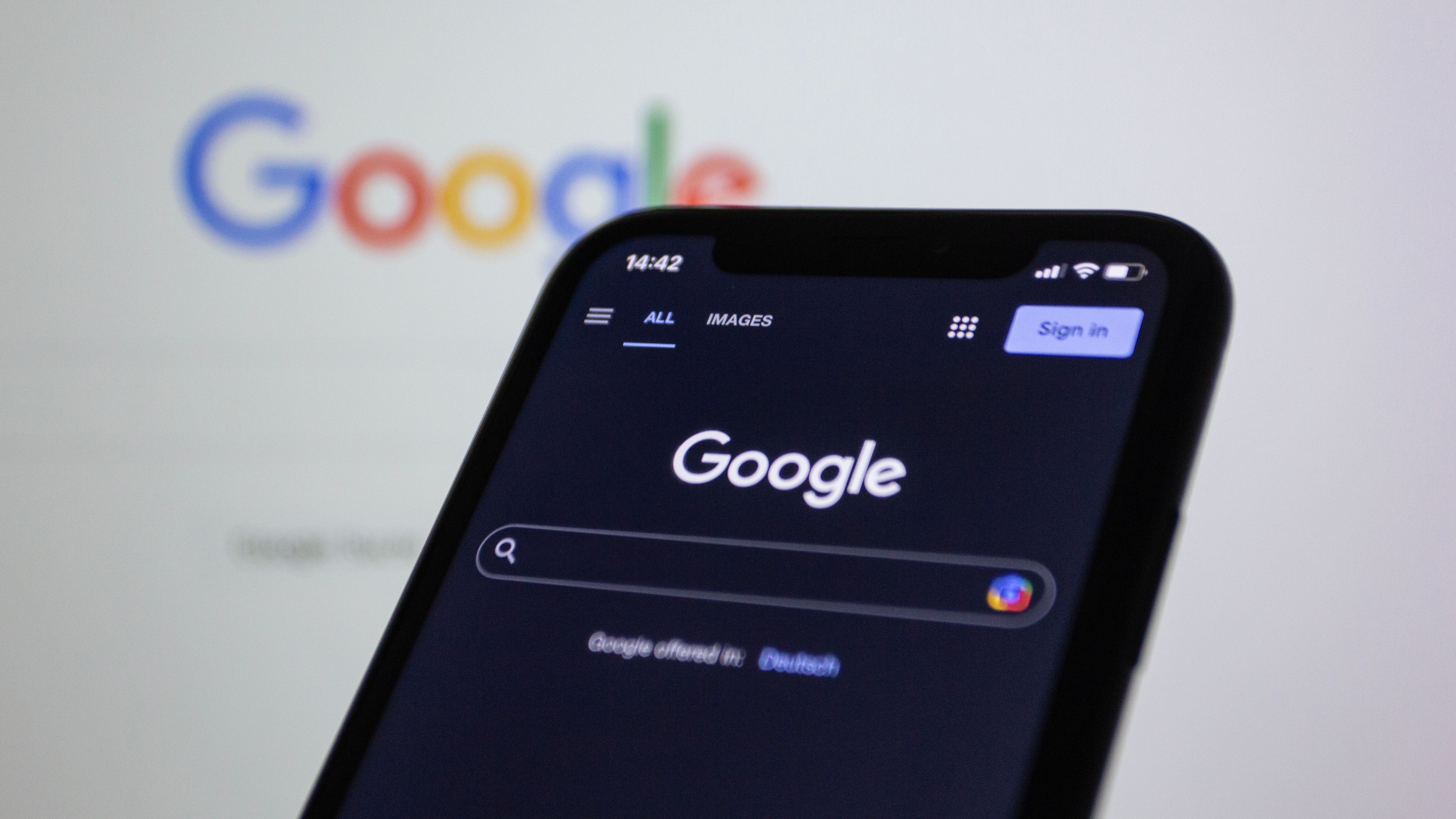 Smartphone displaying a Google search page with search results for local businesses
